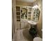 Stylish powder room with decorative sink and custom cabinet storage at 2872 Jeremy Ct, Carmel, IN 46033