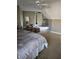 Spacious bedroom with an exercise bike and an open doorway to a hallway at 2872 Jeremy Ct, Carmel, IN 46033