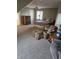 Cozy bedroom featuring a plush armchair, dresser, and comfortable queen bed at 2872 Jeremy Ct, Carmel, IN 46033