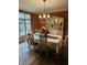 Formal dining room with hardwood floors and elegant chandelier lighting at 2872 Jeremy Ct, Carmel, IN 46033