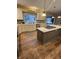 Bright kitchen with stainless steel appliances, ample counter space, and large window at 2872 Jeremy Ct, Carmel, IN 46033