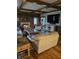 Comfortable living room featuring a stone fireplace and built-in wooden shelving at 2872 Jeremy Ct, Carmel, IN 46033