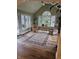 Bright sunroom with hardwood floors, lots of windows, and neutral decor at 2872 Jeremy Ct, Carmel, IN 46033