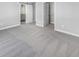 Bedroom with sliding barn door to bathroom and closet provides ample natural light and neutral carpeting at 3124 Sharon Cir, Brownsburg, IN 46112