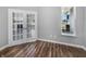 Bright office with French doors and a large window overlooking the front yard, with wood flooring at 3124 Sharon Cir, Brownsburg, IN 46112
