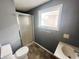 Bathroom with a tub/shower combo, tiled floor, and natural light at 316 W 6Th St, Anderson, IN 46016
