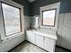 Bright bathroom featuring a sink, and windows for natural light at 316 W 6Th St, Anderson, IN 46016