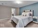 Comfortable bedroom with a bed, stylish headboard, and modern decor at 350 N Meridian St # 610, Indianapolis, IN 46204