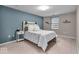 Comfortable bedroom with a bed, stylish headboard, and modern decor at 350 N Meridian St # 610, Indianapolis, IN 46204