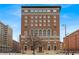 Stunning brick building featuring ornate architectural details under a bright blue sky at 350 N Meridian St # 610, Indianapolis, IN 46204