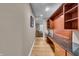 Hallway features built in desk with granite counter and storage shelving at 350 N Meridian St # 610, Indianapolis, IN 46204