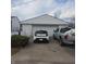 View of the garage and driveway at 3701 N Audubon Rd, Indianapolis, IN 46218