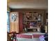 Bright living room with wooden door and red accents at 3701 N Audubon Rd, Indianapolis, IN 46218