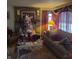 A home's living room featuring comfortable seating with decor throughout at 3701 N Audubon Rd, Indianapolis, IN 46218
