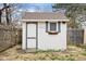 Backyard shed with a window and door at 4108 Carson Ave, Indianapolis, IN 46227