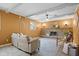 Welcoming Gathering room featuring a stone fireplace, exposed beams, and ample space at 4108 Carson Ave, Indianapolis, IN 46227