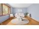 Cozy living room featuring a soft color palette, hardwood floors and lots of natural light at 4108 Carson Ave, Indianapolis, IN 46227