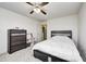 Comfortable bedroom featuring a spacious bed and storage furniture at 4135 Benicia Ln, Indianapolis, IN 46235
