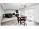 Open concept living and dining area, seamlessly connecting with the kitchen, offers flexibility and room to entertain at 4135 Benicia Ln, Indianapolis, IN 46235