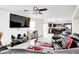 Spacious open living room with a kitchen and a black leather couch at 4135 Benicia Ln, Indianapolis, IN 46235