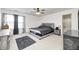 Spacious Primary bedroom with neutral colors and an ensuite bathroom at 4135 Benicia Ln, Indianapolis, IN 46235