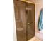 Bathroom features glass shower doors and tile walls at 4214 Woodsage Trce, Indianapolis, IN 46237