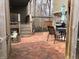 Brick patio with outdoor dining set and grill, perfect for entertaining in the backyard at 4214 Woodsage Trce, Indianapolis, IN 46237