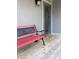 Covered porch with a bench, providing a welcoming entrance to the home at 4214 Woodsage Trce, Indianapolis, IN 46237