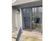 View of a sliding glass door that opens to a deck with outdoor seating area at 4214 Woodsage Trce, Indianapolis, IN 46237