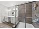 Modern bathroom featuring a glass-enclosed shower with tiled walls and double sinks at 462 N Crystal Dr, Fortville, IN 46040