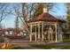 Exterior shot of a gazebo and benches at a park in a neighborhood on a sunny day at 462 N Crystal Dr, Fortville, IN 46040