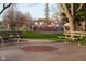 Park view with benches, playground equipment, and houses in the background at 462 N Crystal Dr, Fortville, IN 46040