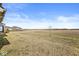 A view of the flat backyard extending into the surrounding farmland at 4763 Denton Dr, Zionsville, IN 46077