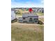 The backyard features a large window and patio with a yard at 4763 Denton Dr, Zionsville, IN 46077