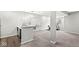 Finished basement with a bar area, exercise equipment, and a whiteboard, creating a versatile living space at 4763 Denton Dr, Zionsville, IN 46077