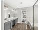 Bathroom featuring double sinks and access to main bedroom at 4763 Denton Dr, Zionsville, IN 46077