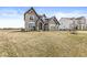 Charming two-story brick home with a large lawn, perfect for outdoor activities and relaxation at 4763 Denton Dr, Zionsville, IN 46077