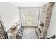 Aerial view of open-concept living area featuring a stone fireplace at 4763 Denton Dr, Zionsville, IN 46077