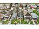 An aerial view of a home nestled in a neighborhood with mature trees and well-kept lawns at 4933 Ford St, Indianapolis, IN 46224