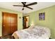 Bedroom with a ceiling fan and closet, offering a cozy and functional space at 4933 Ford St, Indianapolis, IN 46224