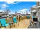 Relaxing front porch features comfortable seating, a grill, and a swing for outdoor enjoyment at 4933 Ford St, Indianapolis, IN 46224