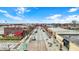 Street view captures a commercial area with brick buildings, street trees, and vintage street lamps at 4933 Ford St, Indianapolis, IN 46224