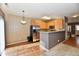The kitchen features stainless steel appliances, and ample counter space with cabinets for storage at 4951 Tuscany Ln, Indianapolis, IN 46254