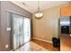 Dining nook featuring sliding glass doors and a stainless steel refrigerator at 4951 Tuscany Ln, Indianapolis, IN 46254