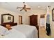 Spacious bedroom featuring a ceiling fan, neutral walls, and ensuite bathroom access at 4951 Tuscany Ln, Indianapolis, IN 46254