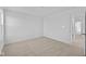 Spacious bedroom with neutral carpet, ample natural light, and walk-in closet at 5208 Rolling Meadow Blvd, Indianapolis, IN 46237