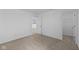 Bedroom featuring neutral walls and plush carpeting adjacent to a walk-in closet at 5208 Rolling Meadow Blvd, Indianapolis, IN 46237
