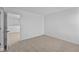 Neutral bedroom features carpet, large window and ample space at 5208 Rolling Meadow Blvd, Indianapolis, IN 46237