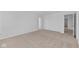 Spacious bedroom with neutral carpet and white walls, providing a bright and airy feel at 5208 Rolling Meadow Blvd, Indianapolis, IN 46237