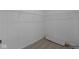 Walk-in closet featuring built-in shelving and neutral carpet at 5211 Rolling Meadow Blvd, Indianapolis, IN 46237